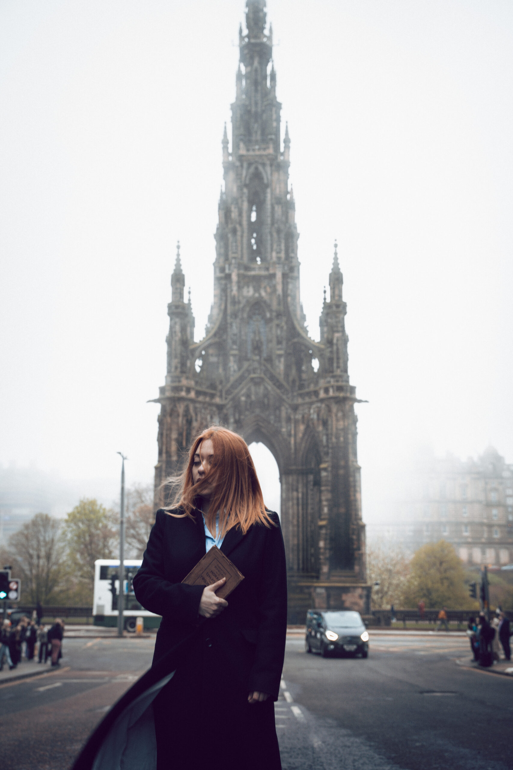 Portrait woman mist monument town